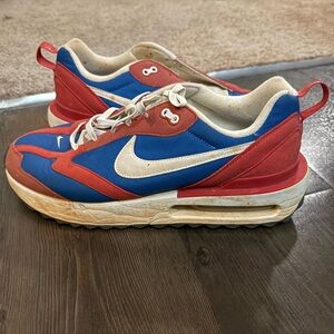 Nike Air Max Dawn in Team Royal/Summit White-Red Clay.